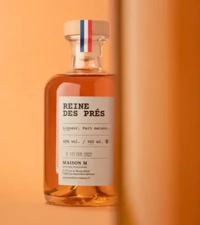 Flacon de digestif de montagne à la Reine des Prés de la distillerie Maison M.